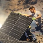 Installing solar photovoltaic panel system. Solar panel technici